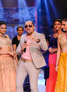 Ali Quli Mirza walks the ramp with models