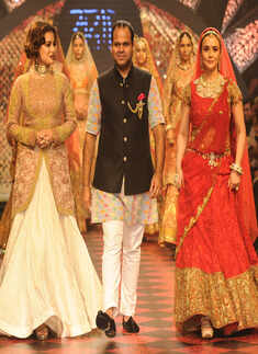 Dia Mirza and Preity Zinta showcase a creation