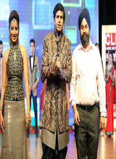 Designer Tajinder Singh walks the ramp with showstopper Siddhesh Pai
