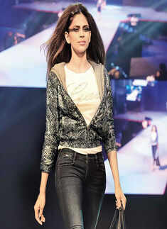 A model walks the ramp during the Honda RevFest 2015