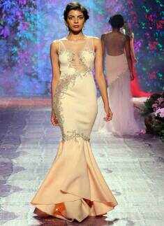 A model walks the ramp for designer