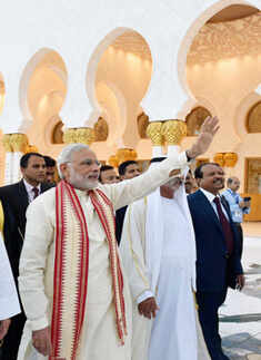 Prime Minister Narendra Modi waves to people