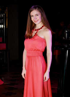 Angelika looks stunning during a cocktail party