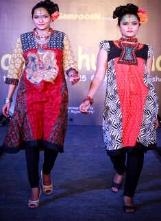 Models walk the ramp during a fashion show
