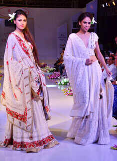 ​Models walk the ramp during Jaipur Couture Show