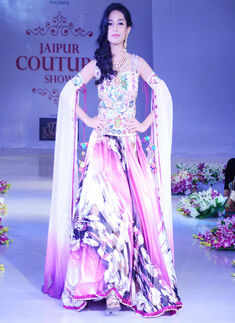 Actress Amrita Rao showcases a designer creation