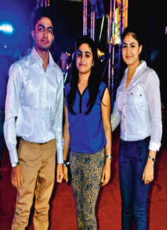Akshat, Amisha and Anushree pose for a photo