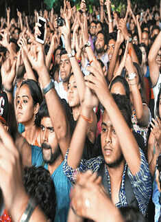 The crowd enjoys during the event
