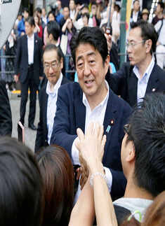 Shinzo Abe claims win in poll