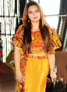 Socialites attend an exhibition