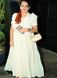 Socialites attend an exhibition