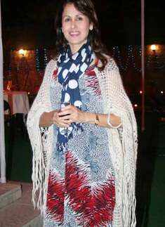 Kiran and Satish Gujral's party