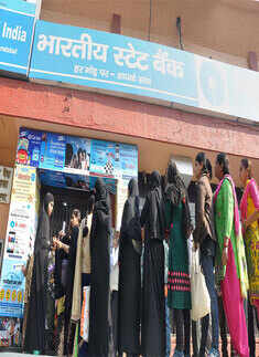 Currency ban: Long queues at banks, ATMs