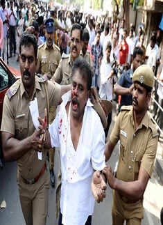 Angry AIADMK cardres assault Sasikala's husband & lawyers