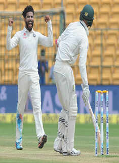 ​ Ravindra Jadeja celebrates after taking wicket