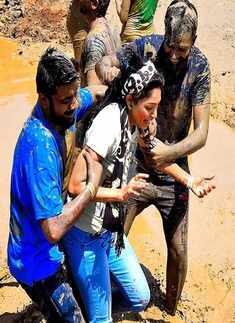 Youngsters take a mud bath