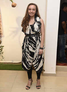 Yana attends a designer collection showcase