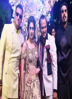 Mohammed Morani and Lucky Morani walk the ramp for Lalit Dalmia