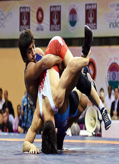 ​ Bajrang Punia fights with Seungchul Lee