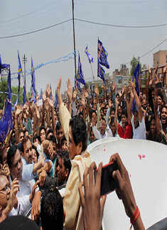 BSP supremo Mayawati waves her hand