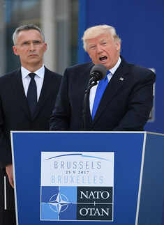 Donald Trump speaks during the NATO summit