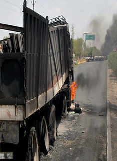 A truck torched by farmers