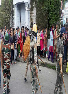Security personnel guard during a strike in Darjeeling
