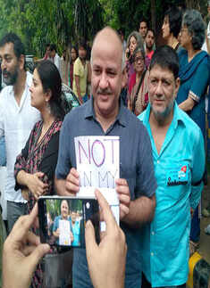 Manish Sisodia take part in a silent protest