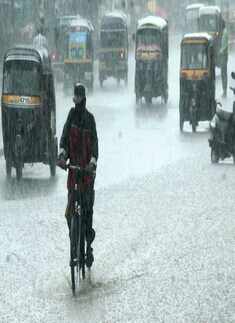 Vehicles plying on the submerged road during
