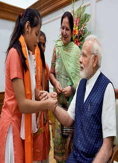 India: PM Modi celebrates Raksha Bandhan