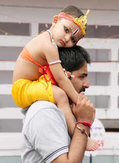 Cute kids dressed up as Lord Krishna