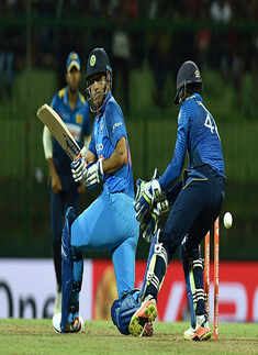 Mahendra Singh Dhoni plays a shot