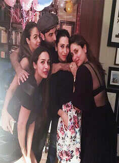 Karisma bonds with family and friends