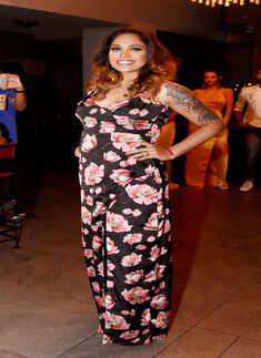 Socialites attend an event to enhance an evening party look