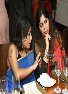 Club members enjoy Bengali food with wine