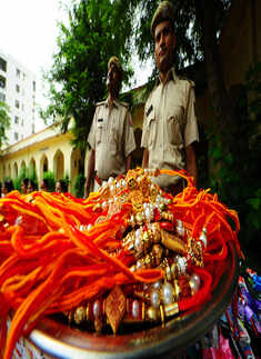 Women tie rakhis to jawans, police personnel