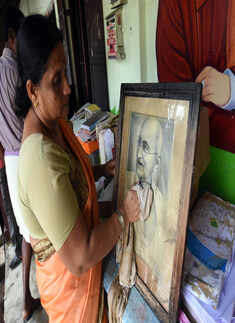 Kerala flood victims return to devastated homes