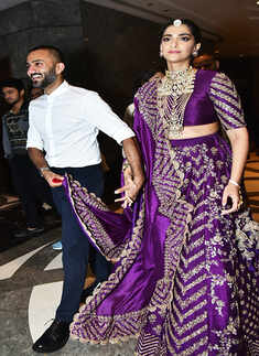 Sonam Kapoor blushes as hubby Anand Ahuja holds her dupatta