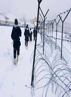 Tourists enjoy fresh snowfall in Kashmir