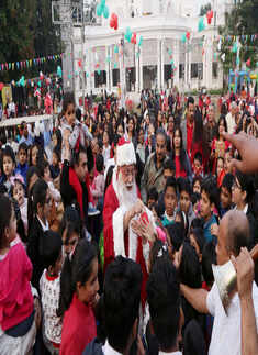 Tollygunge Club members celebrate Christmas with children