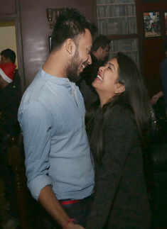 Revellers groove to the tune of violin