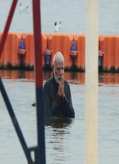 PM Modi takes holy dip at Kumbh