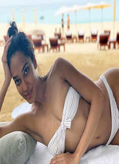 Bikini-clad Lisa Haydon beats the heat in style