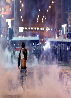 Hong Kong protesters hurl petrol bombs after police fire tear gas to clear rally