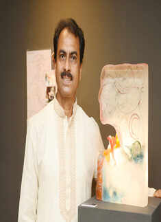 Art enthusiasts attend a glass sculpture show