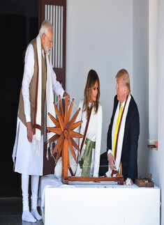 Donald Trump tries his hand at charkha at Sabarmati Ashram
