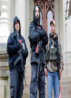 In pics: Armed protesters storm Michigan State House over COVID-19 lockdown