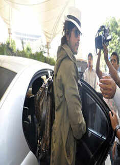 SRK spotted in new look