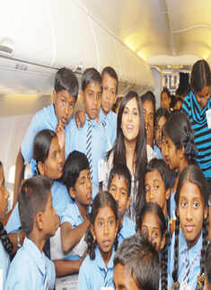 Ramya on board a flight
