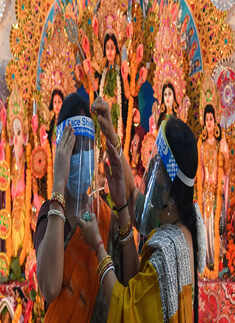 Devotees celebrate Durga Puja with COVID-19 safety protocols